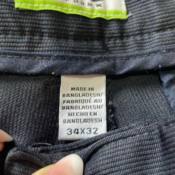 Izod Perform X straight leg pants Flat front Subtle texture Mens size 34 Navy - Picture 11 of 13